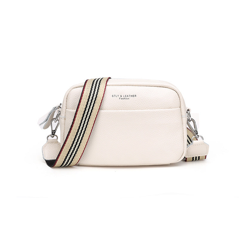 Sac bandoulière asymétrique net noir‑rouge
