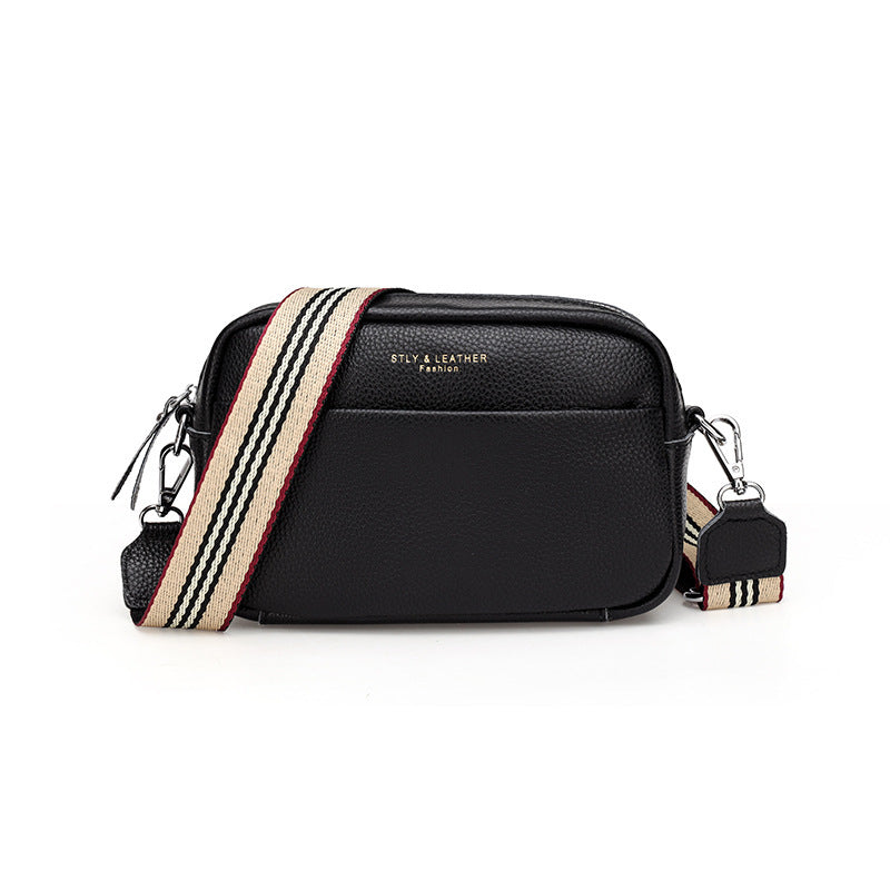 Sac bandoulière asymétrique net noir‑rouge